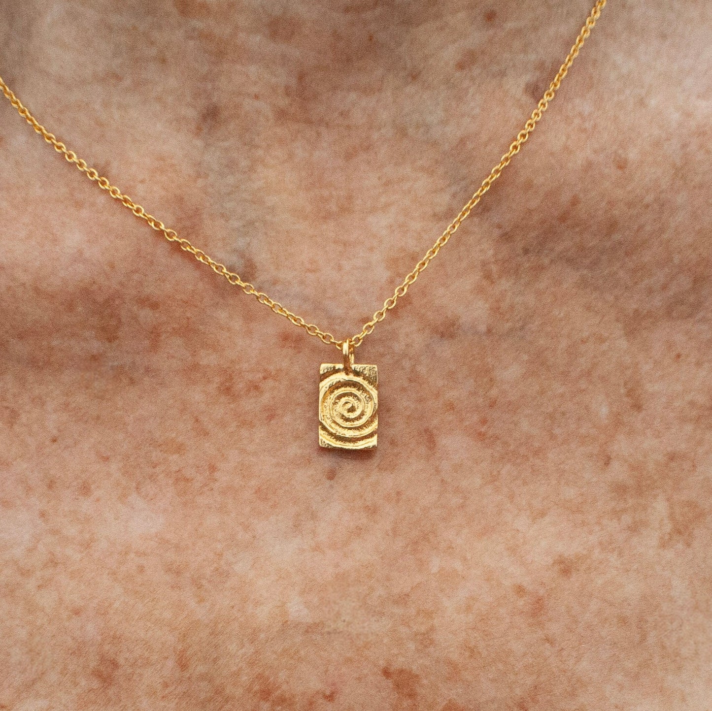 Golden Vertigo Amulet