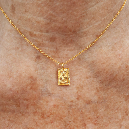 Golden S Amulet